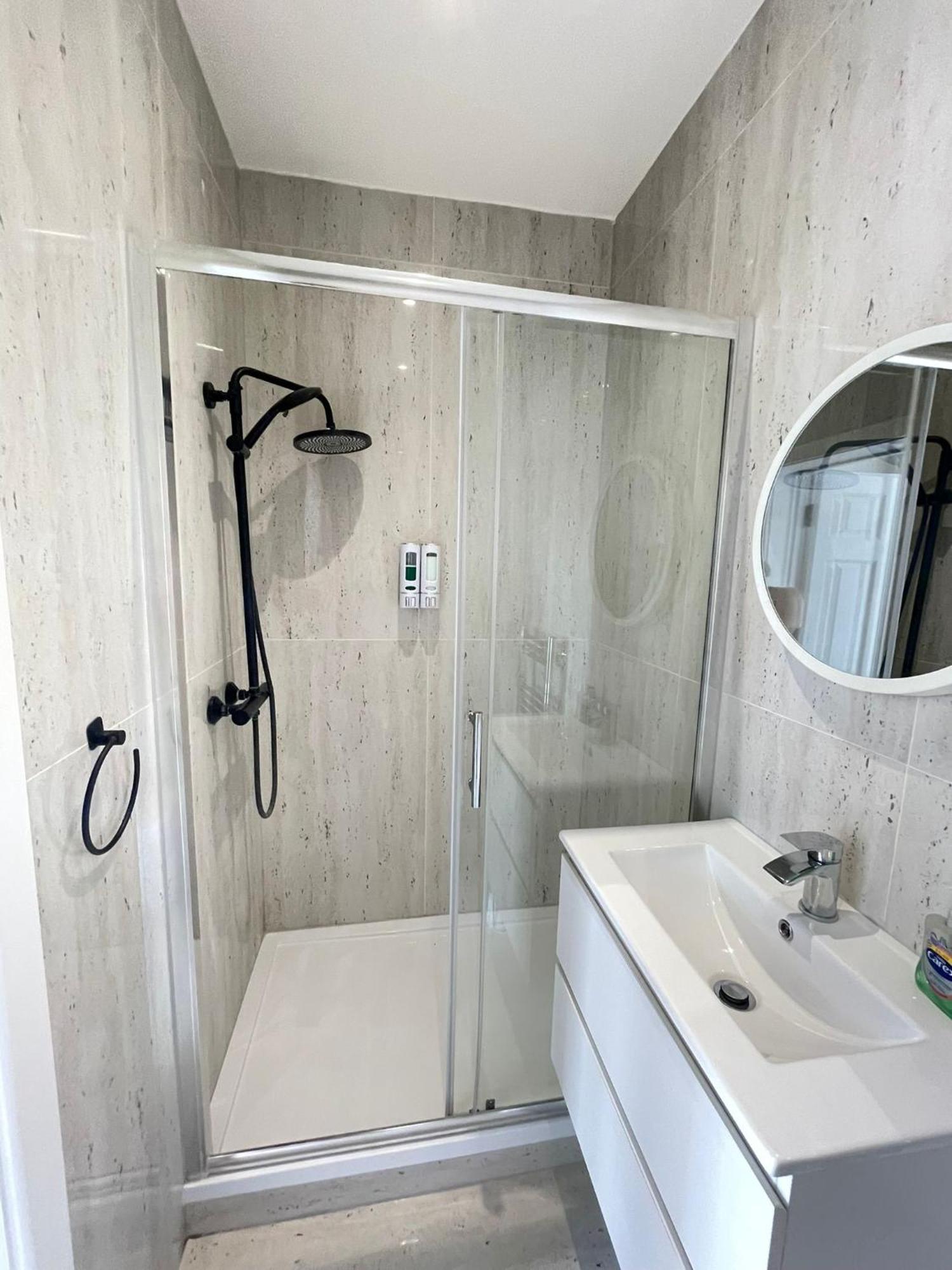 Comfortable Bay Window Stone Private Bathroom Edgware